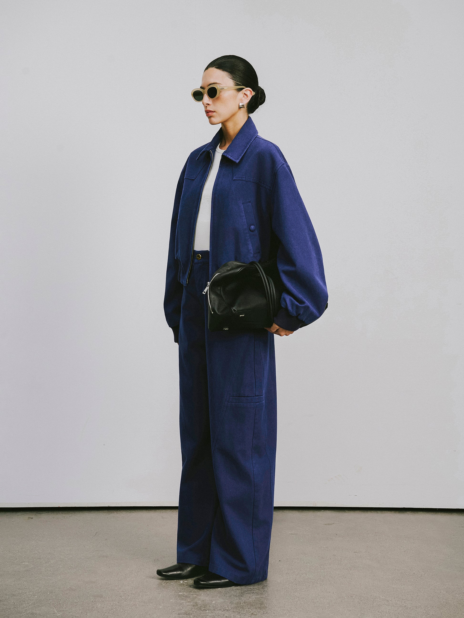 High-Rise Curved Hem Denim Pants