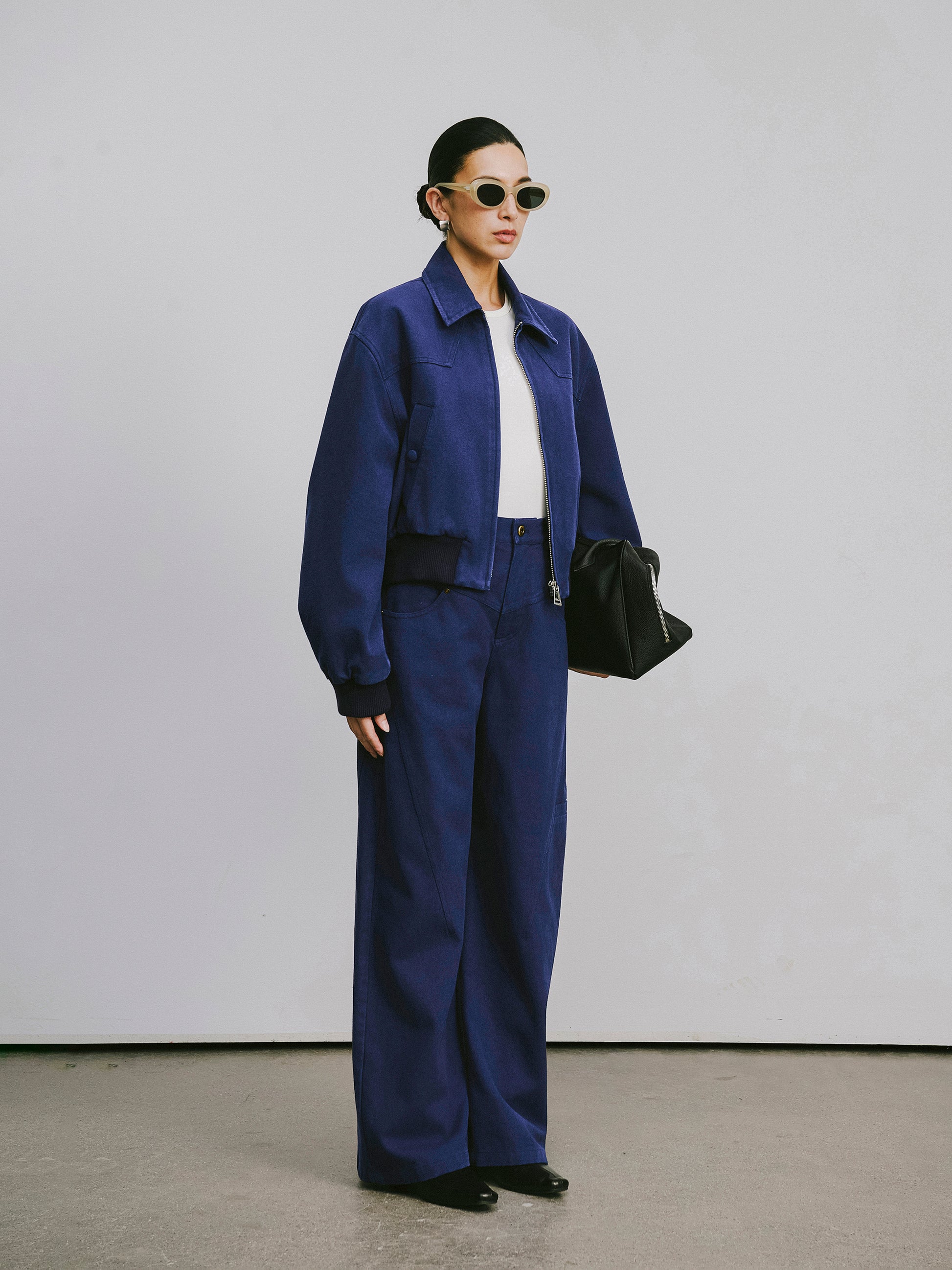 High-Rise Curved Hem Denim Pants