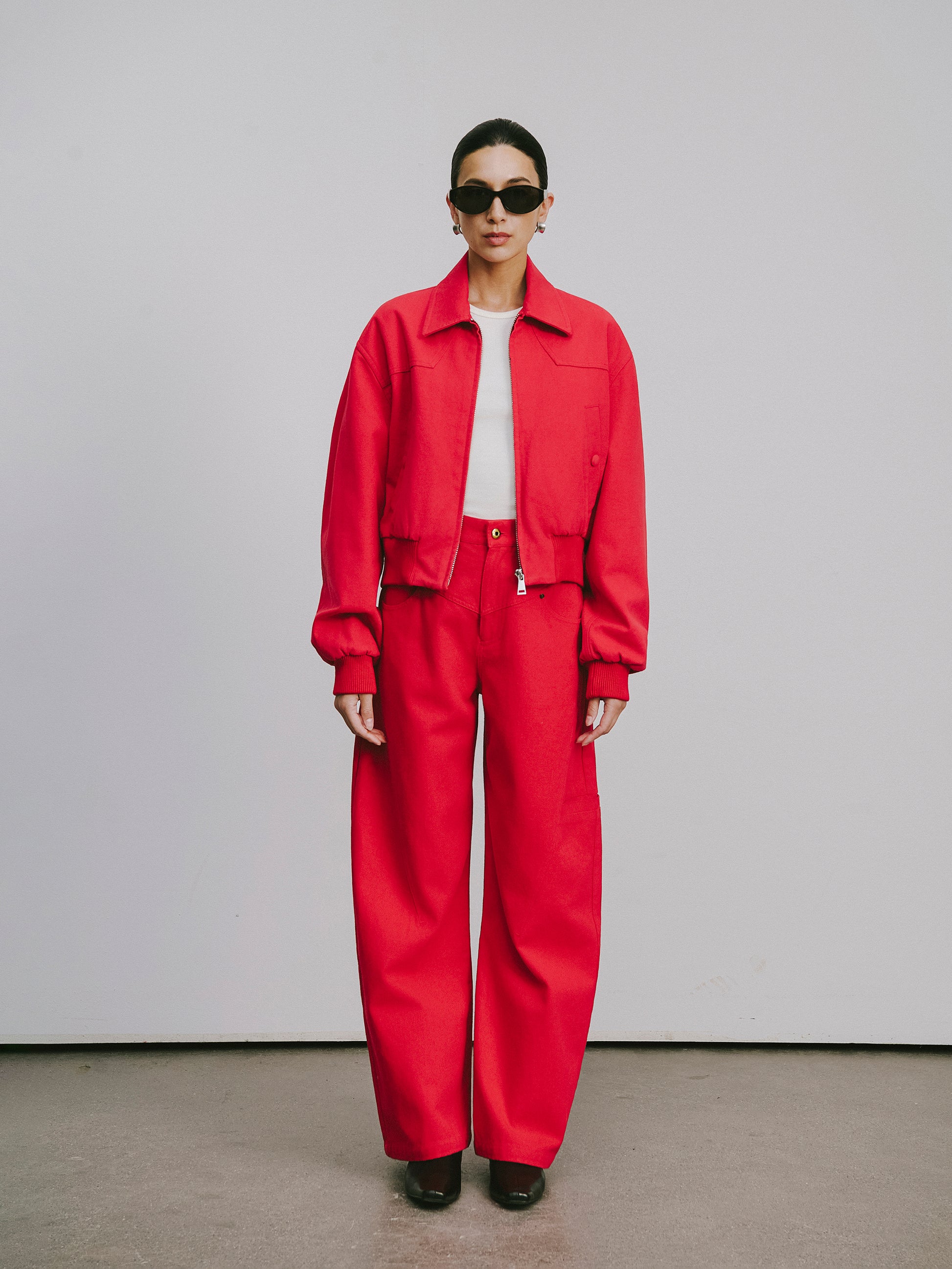 High-Rise Curved Hem Denim Pants